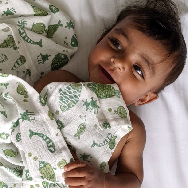 Kids Organic Cotton Koi Mint Swaddle | Verified Sustainable Kids Daywear Sets on Brown Living™