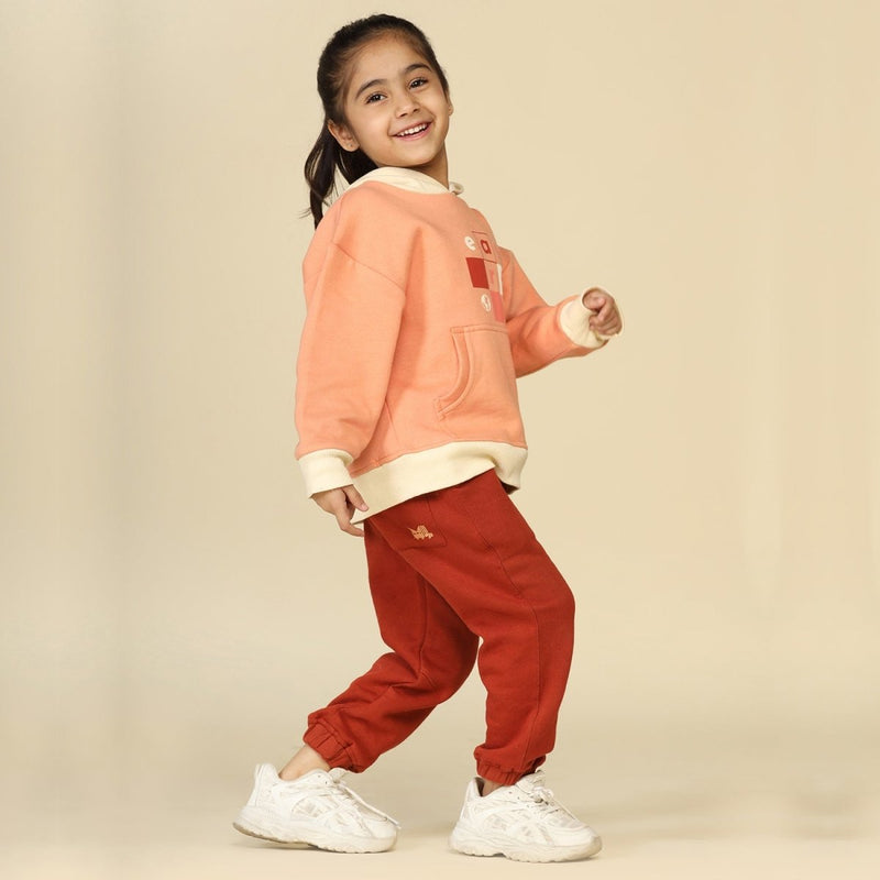 Buy Brick Red Unisex Joggers in Cotton Fleece | Planet First | Shop Verified Sustainable Kids Pajamas on Brown Living™