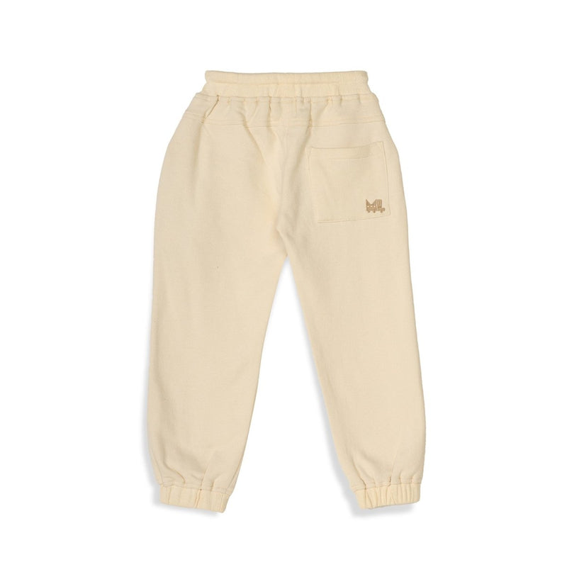 Buy Cream Unisex Joggers in Cotton Fleece | Planet First | Shop Verified Sustainable Kids Pajamas on Brown Living™