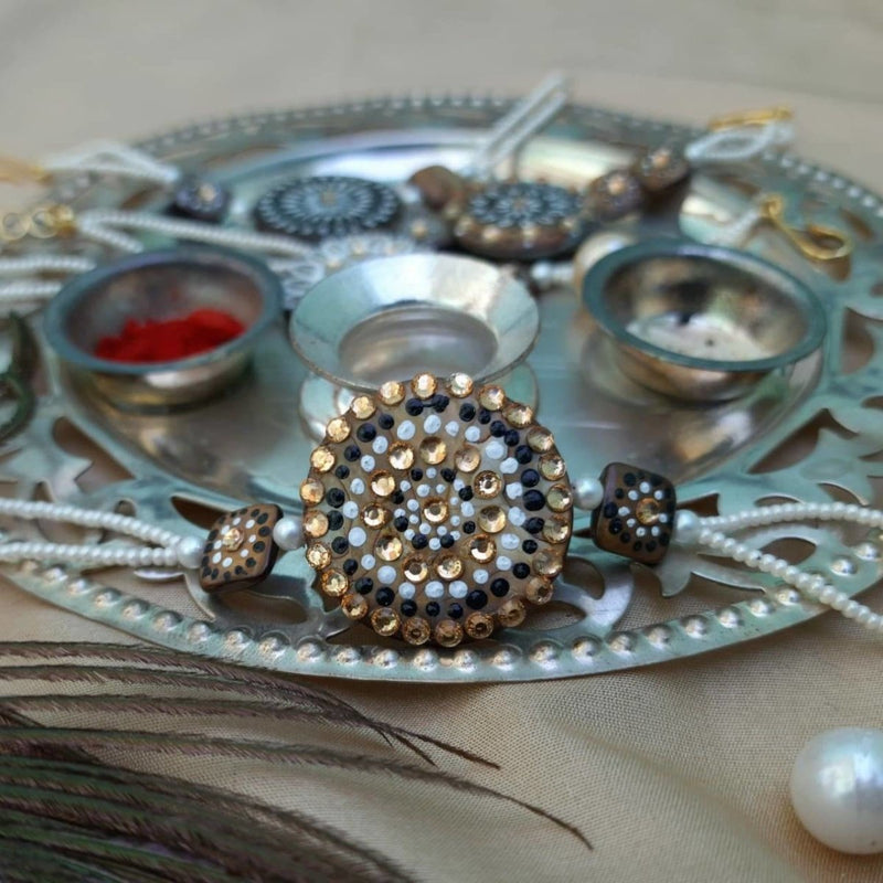 Buy Hand painted pearl shell rakhi | Shop Verified Sustainable Rakhi on Brown Living™