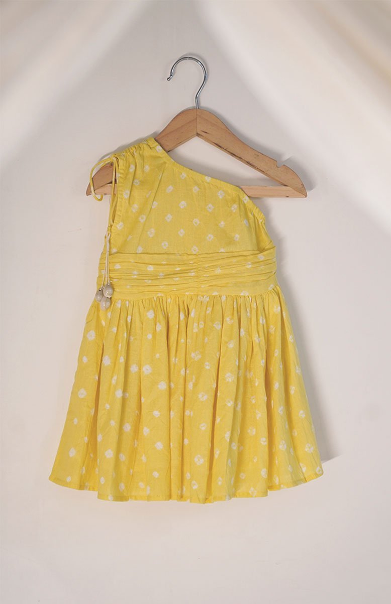 Buy Head Over Heels' One Shoulder Bandhani Girls Dress In Yellow | Shop Verified Sustainable Kids Frocks & Dresses on Brown Living™