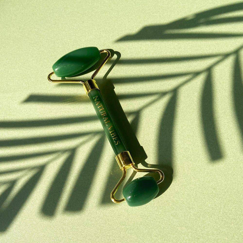 Buy Jade Roller & Massager with FREE Gold Beauty Elixir Oil | Shop Verified Sustainable Massager on Brown Living™