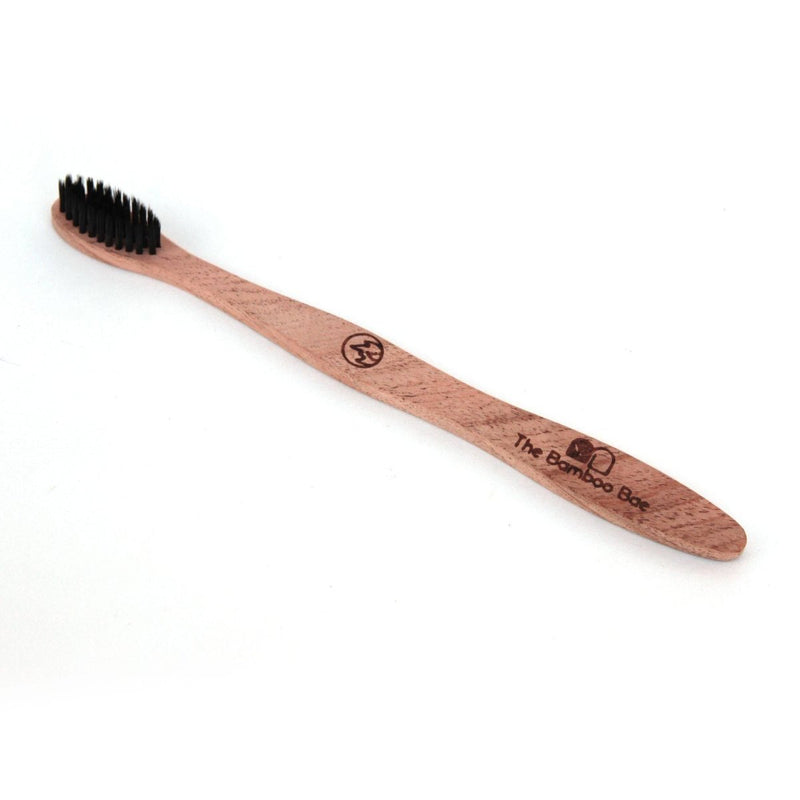 Buy Neem Wood Toothbrush | Curve Handmade Handle | Charcoal Infused Bristles Antibacterial Properties | Shop Verified Sustainable Tooth Brush on Brown Living™