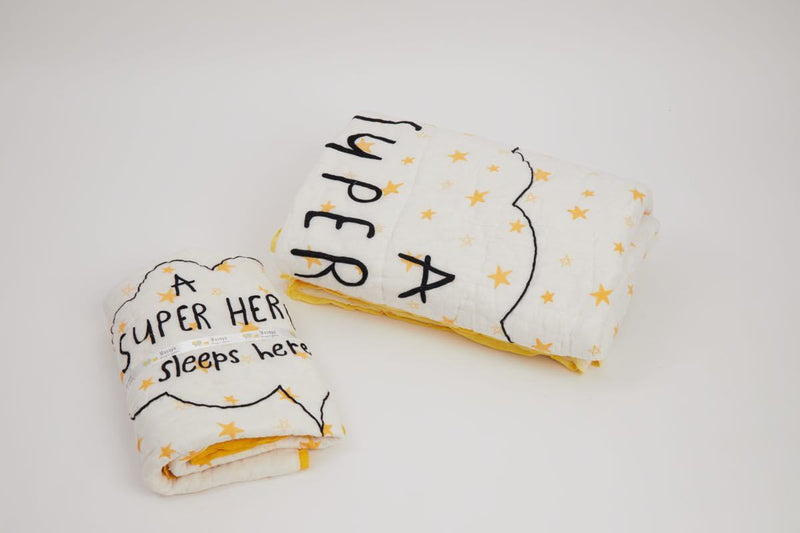 Buy Quilt - Ace The Superbaby Flies Over Town | Shop Verified Sustainable Bed Linens on Brown Living™