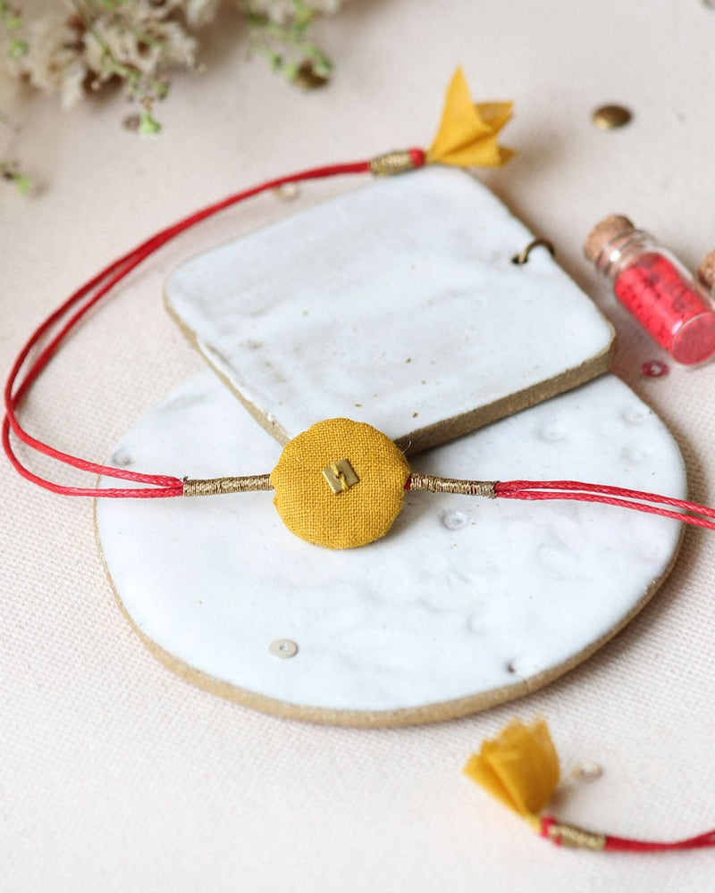 Buy Upcycled Artisanal Rakhi- Yellow & Red | Shop Verified Sustainable Rakhi on Brown Living™