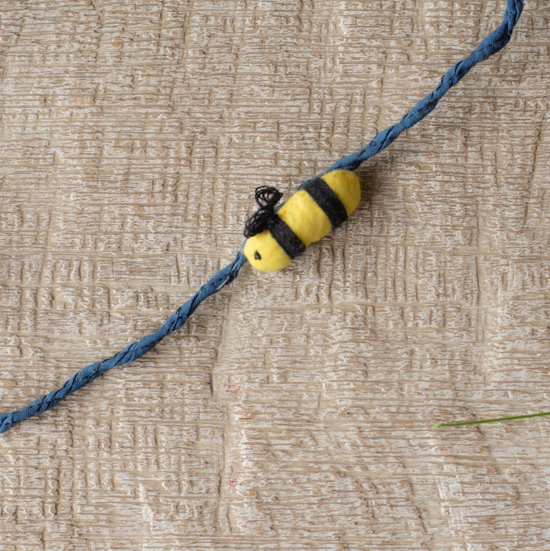 Buy Upcycled Hand Stitched Bee Kids Rakhi | Shop Verified Sustainable Rakhi on Brown Living™